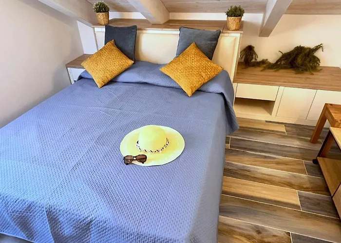 Mansarda Oblique Maiori